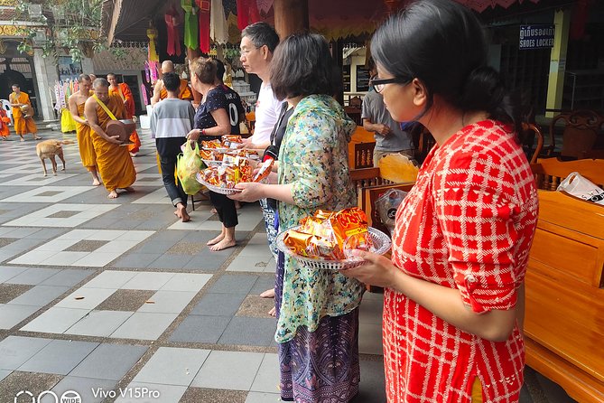 4 highlights: Sticky Waterfall/Elephants/local market /Wat Banden - Sticky Waterfall time: walking the falls and the Thai-style massage bath