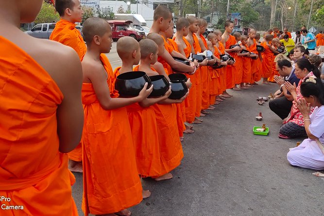 4 highlights: Sticky Waterfall/Elephants/local market /Wat Banden - Monk alms at dawn: the most meaningful part of the itinerary