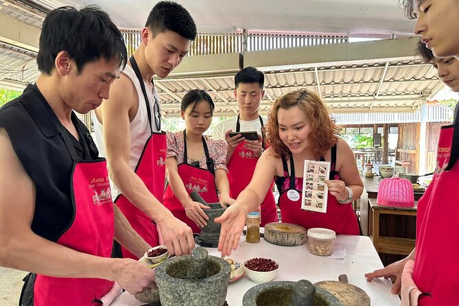 Authentic Thai Cooking Class and Farm Visit in Chiang Mai - Open-air kitchen cooking: your hands on, your mouth ready