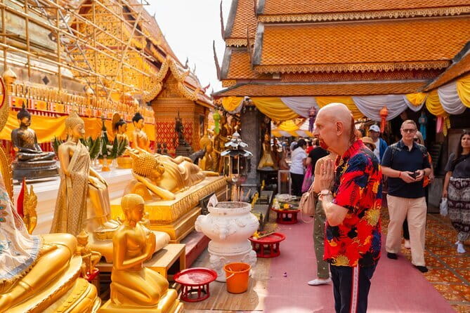 Chiang Mai: Doi Suthep Temple and Waterfall by Songtaew Trio - A 4-hour temple-and-waterfall loop that feels local