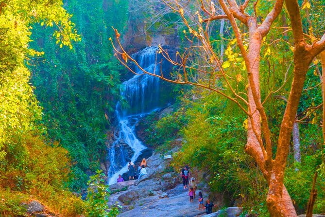 Chiang Mai: Doi Suthep Temple and Waterfall by Songtaew Trio - Wat Phra That Doi Suthep: holy relic, big steps, and skyline views