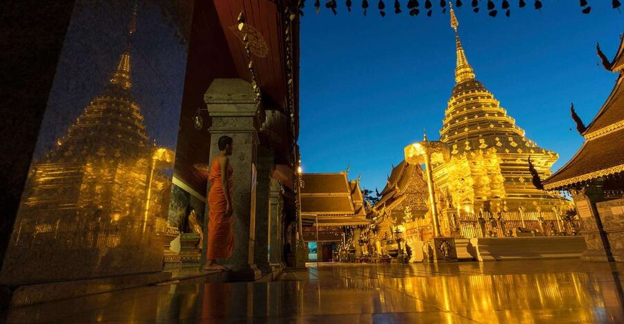 Chiang Mai: Doi Suthep & Wat Umong Twilight Tour with Pickup - Wat Phra That Doi Suthep at night: Naga steps, golden glow, and the big viewpoint