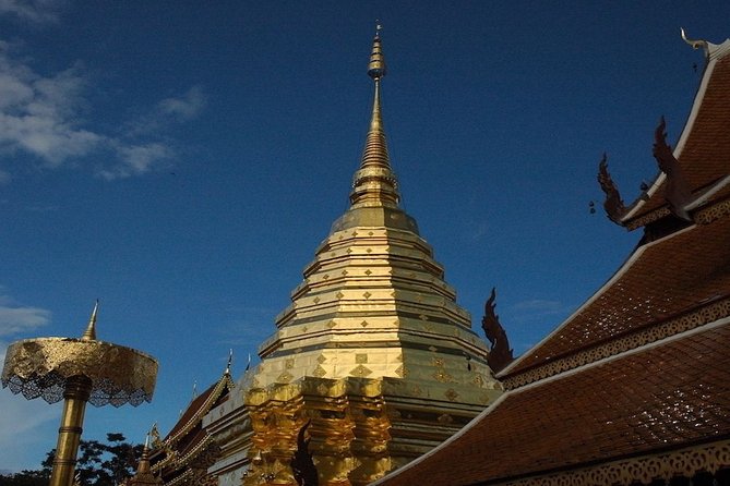 Chiang Mai: Guided City & Temple Discovery with Hotel Pickup - Wat Chedi Luang: historic center temple energy