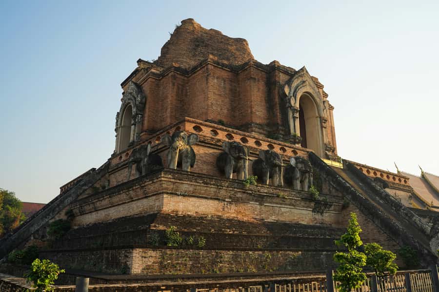 Chiang Mai Light: Tuk Tuk Night Tour with Temples & Markets - Night tuk-tuk in Chiang Mai: temples lit up, markets humming