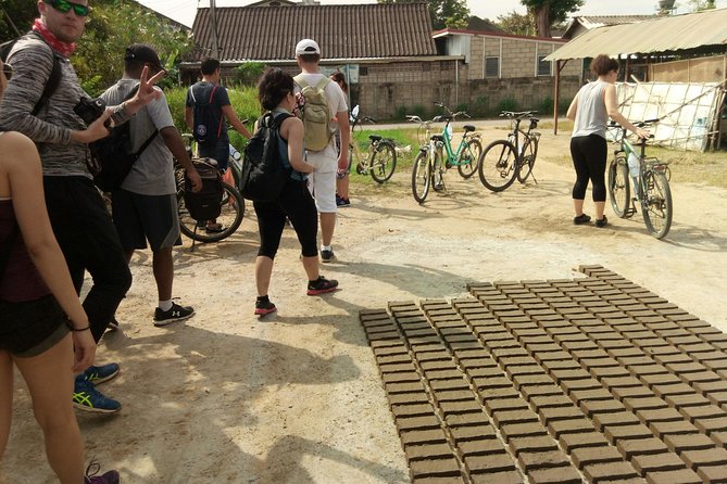 Chiang Mai Paradise Full-Day Cycling Adventure Tour - Markets, a Centuries-Old Chedi, and the Runway Back to Town