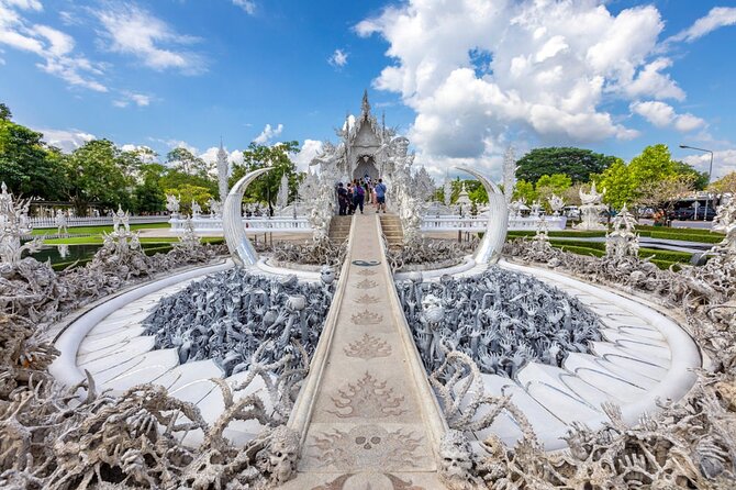 Chiang Mai to White & Blue Temple, Black Museum & Golden Triangle - Wat Rong Khun (White Temple): modern Buddhist art with teeth