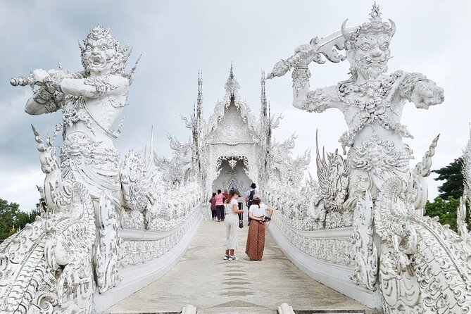 Chiang Rai Famed Temples and Golden Triangle Tour from Chiang Mai - Karen Long Neck Village: A 30-Minute Cultural Stop with Tradeoffs