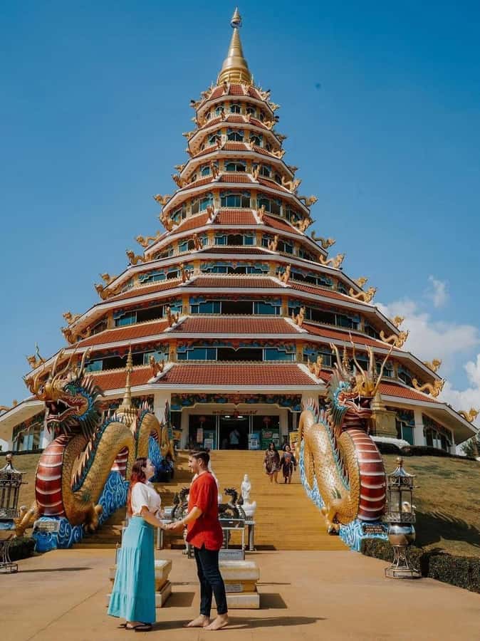 Chiang Rai IG Lalitta Cafe and White, Blue, Red Temples Tour - Wat Huay Pla Kang (Red Temple): 9-floor pagoda and the big Buddha