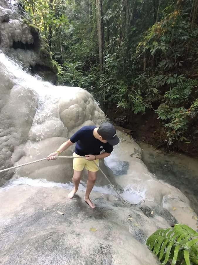 Climb Sticky Waterfall Like Spiderman - Snacks and drinks by the falls: small comfort that keeps you going