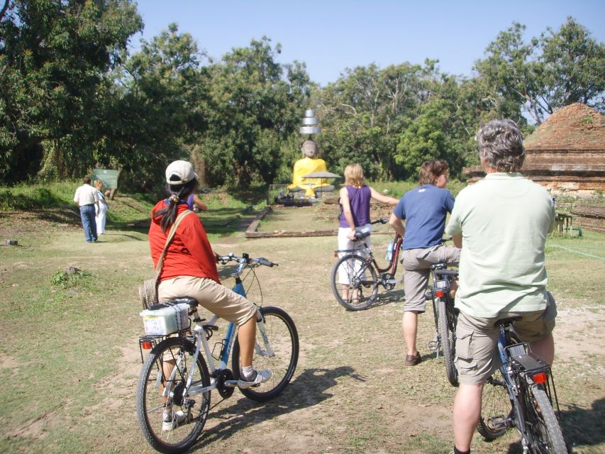 Colors of Chiang Mai Guided Bicycle Tour - Temple stop: Buddhism explained in everyday terms