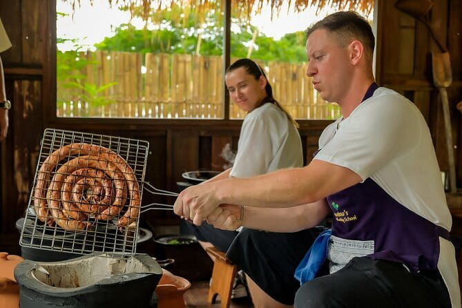 Cook Local Northern Thai Food in Traditional House - Picking ingredients in the local market: the lesson starts before the kitchen