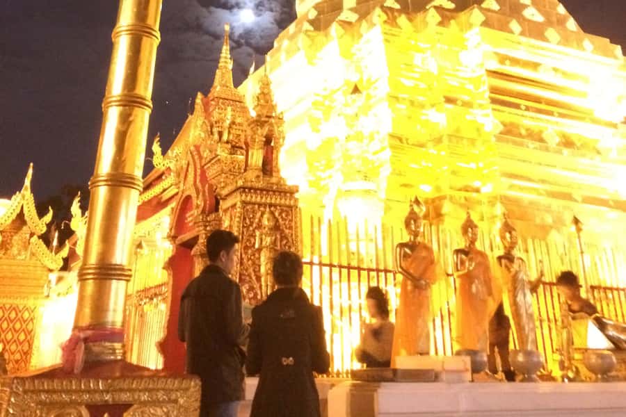 Doi Suthep Hill Tribe Village and Evening Buddhist Service - The small-truck transfer into Khun Chang Kien
