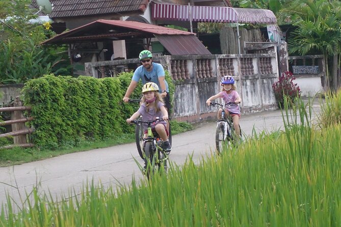 FIELDS OF GOLD Mountain Biking Tour Chiang Mai - Stop 1: Mok Fa Waterfall—photos, a pool break, and an easy reset