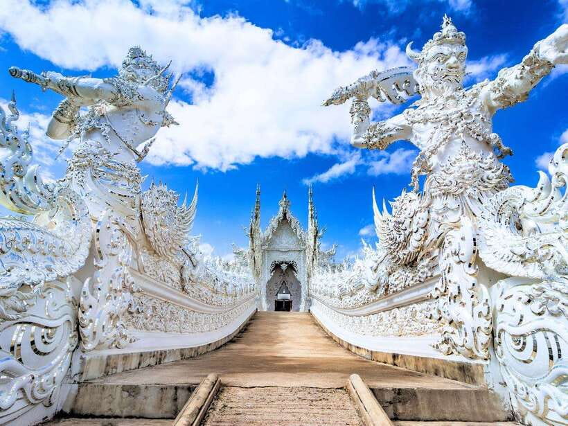 From Chiang Mai: Chiang Rai Famous Temples Guided Tour - Wat Rong Khun White Temple: Contemporary Temple Craft You Can’t Outsmart