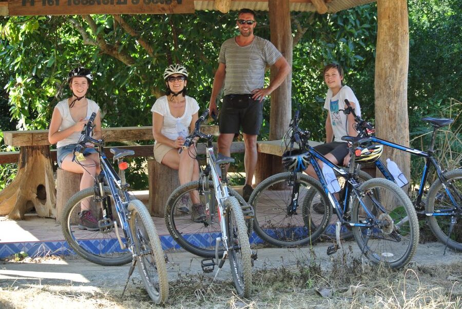 From Chiang Mai: Mae Taeng Valley and Waterfalls Cycle Tour - Morning riding plus a temple stop at Wat Ban Den