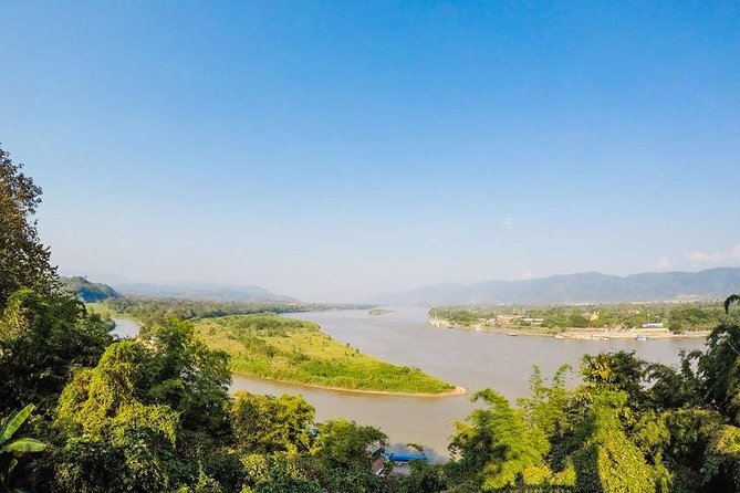 From Chiang Mai: White and Blue Temple & Golden Triangle Day Trip - Mekong River boat time in Chiang Rai Province