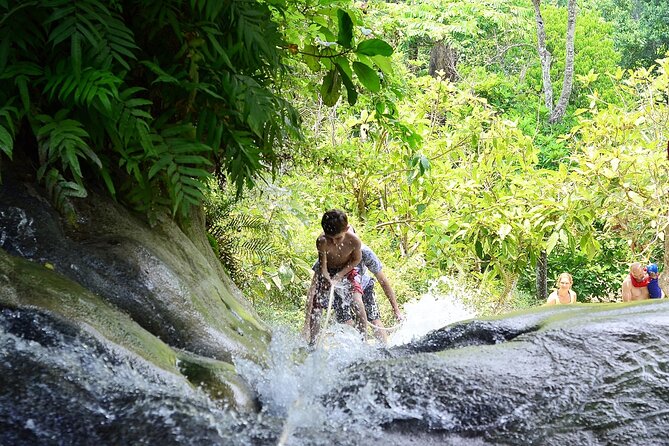 Full Day Chiang Mai Zipline Adventure, Rafting, ATV-ing, and Sticky Waterfall - Tang River white-water rafting: 45 minutes of spray and teamwork
