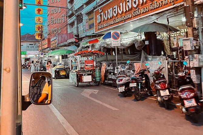 Guided Chiang Mai City Night Tour by EV Tram - Chang Puek Gate Night Market, Wat Nong Kham, and Warorot Market