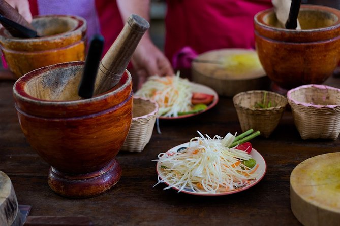 Half-Day Chiang Mai Cooking Class: Make Your Own Thai Foods - Cooking setup: one wok per person, real hands-on work