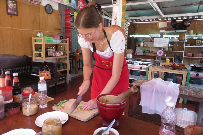 Half-Day Thai Cooking Class and Market Tour From Chiang Mai - Open-air kitchen in a private house: your station, your dishes