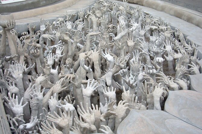 Long Neck Village, White & Blue Temple, Black House Day Tour From Chiang Mai - Stop 4: Wat Rong Seur Ten (Blue Temple) and the Color-Forward Experience