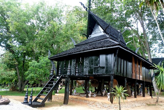 One Day Tour Chiang Rai(White Temple , Blue Temple, Black House) Private Tour - Baan Dam Museum Black House: art that leans into darkness