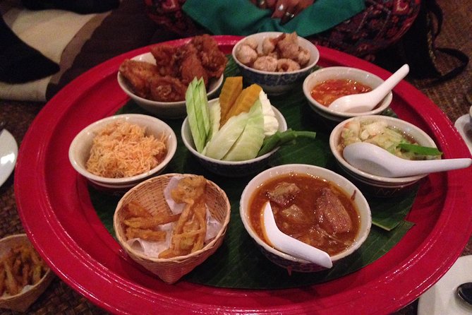 Traditional Khum Khantoke Dinner & Dance Show at Chiang Mai with Return Transfer - Dinner on low circular tables: how the meal is presented