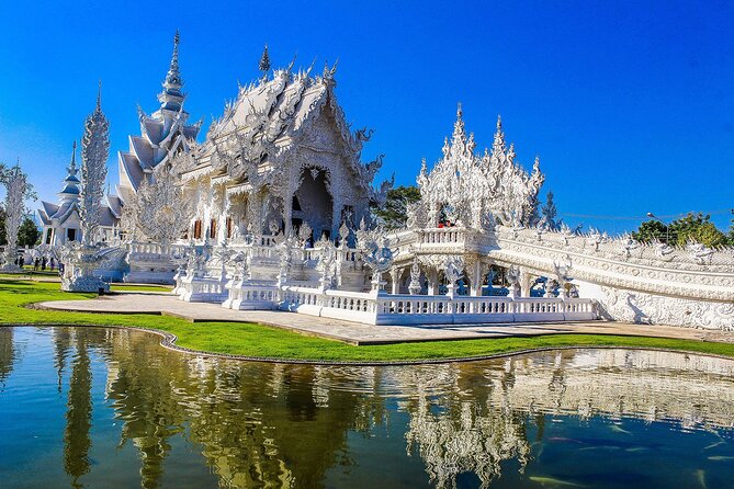 White, Red/Black and Blue Temples Full Day Trip From Chiang Mai - Wat Rong Khun (White Temple): Dress Code and Photo Timing